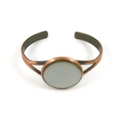 Copper bangle bracelet with iridescent circle