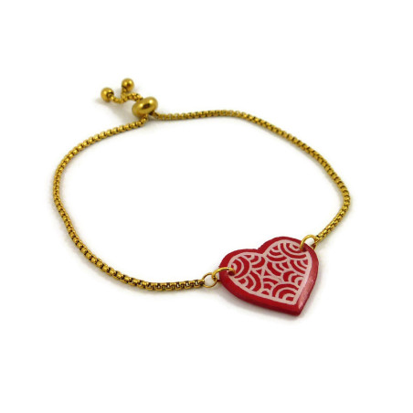 Bracelet réglable en forme de cœur rouge aux volutes blanches