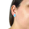 White droplets ear studs with metallic blue doodles