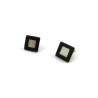 Small iridescent squares ear studs with black outlines