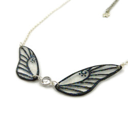 Necklace in the shape of a fairy with transparent and black glittery wings, and white Swarovski crystal