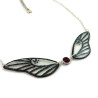 Necklace in the shape of a fairy with transparent and black glittery wings, and red Swarovski crystal
