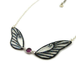 Necklace in the shape of a fairy with transparent and black glittery wings, and purple Swarovski crystal