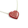Red heart necklace with white doodles