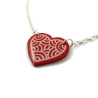 Red heart necklace with white doodles