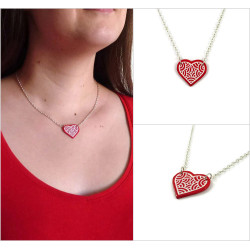 Red heart necklace with white doodles