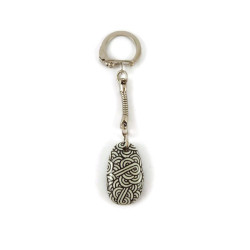 Small painted pebble keychain with black and white doodles