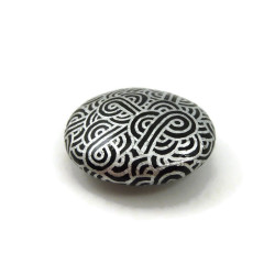 Black painted false pebble with silver doodles magnet