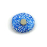 White painted round false pebble with metallic blue doodles magnet