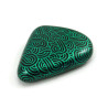 Painted pebble with metallic green doodles on black background