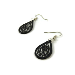 Black droplets dangle earrings with iridescent doodles