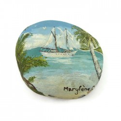 Pebble painted sailboat in the tropics