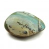 Pebble painted sailboat in the tropics