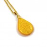 Yellow teardrop necklace with pastel yellow doodles