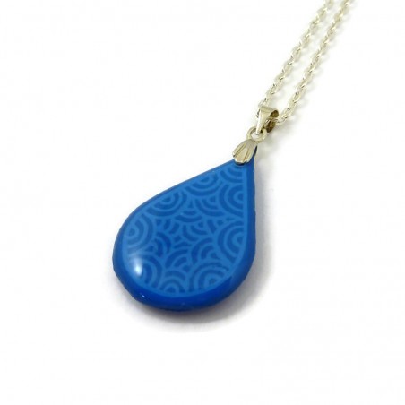 Sky blue teardrop necklace with pastel blue doodles