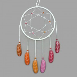 Dreamcatcher with feathers in the colors of the lesbian pride (orange, white and pink)