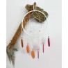 Dreamcatcher with feathers in the colors of the lesbian pride (orange, white and pink)