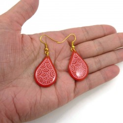 Red raindrops dangle earrings with pink doodles