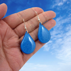 Sky blue teardrops dangle earrings with light blue doodles