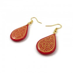 Red raindrops dangle earrings with yellow doodles