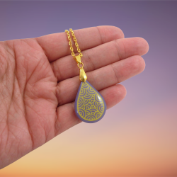 Purple teardrop necklace with yellow doodles