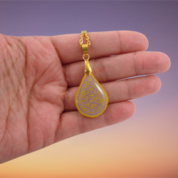 Yellow teardrop necklace with purple doodles