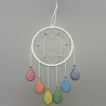 White dreamcatcher with teardrops in the colors of the LGBT flag (red, orange, yellow, green, blue and purple)