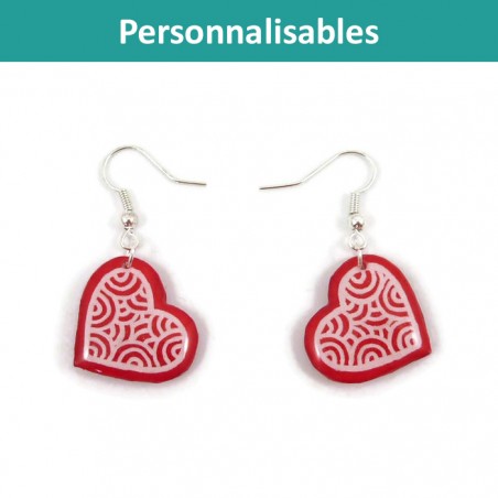 Customizable hearts dangle earrings with white doodles