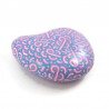 Painted pebble with transgender flag colors doodles
