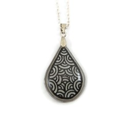 Silver teardrop necklace with black doodles