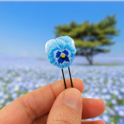 Pastel blue pansy flower bun pin