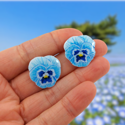 Pastel blue pansies flowers ear ships