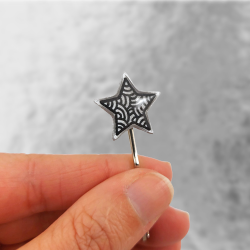 Eco-friendly hair pin in the form of silver star with black doodles