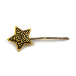 Eco-friendly hair pin in the form of golden star with black doodles