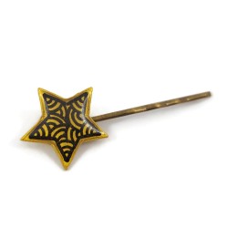 Eco-friendly hair pin in the form of golden star with black doodles