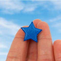 Eco-friendly pin badge in the form of sky blue star with pastel blue doodles