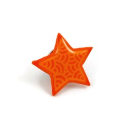 Eco-friendly pin badge in the form of orange star with pastel orange doodles