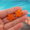 Orange stars with light orange doodles ear studs