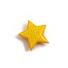 Eco-friendly magnet in the form of yellow star with pastel yellow doodles