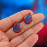 Red droplets ear chips with blue doodles