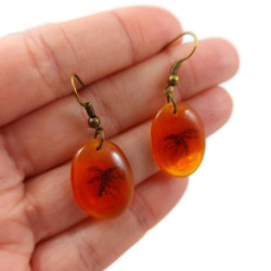 Mosquito in amber ovals dangle earrings