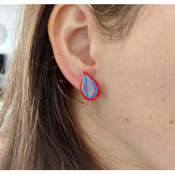 Red droplets ear chips with blue doodles
