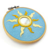 Yellow sun embroidery with round mirror