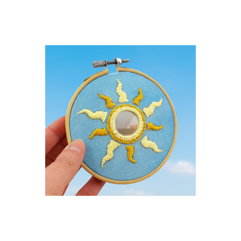 Yellow sun embroidery with round mirror