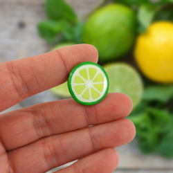 Green lemon slice pin badge