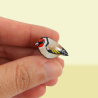 Elegant goldfinch pin badge