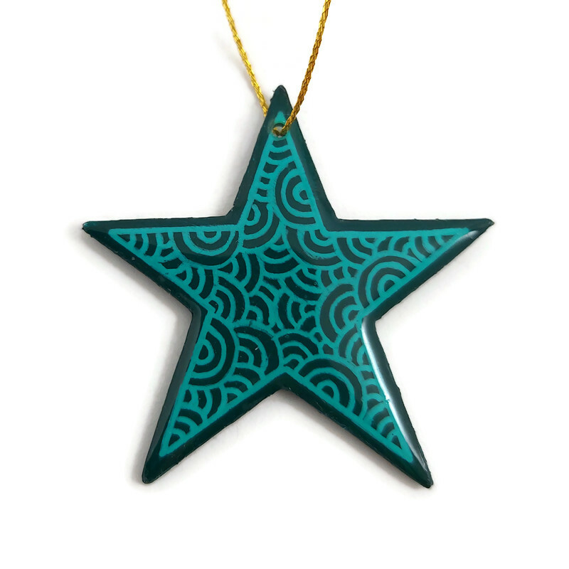 Dark green star suspension with emerald doodles