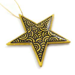 Golden star suspension with black doodles