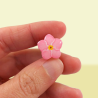 Pink forget me not pin badge