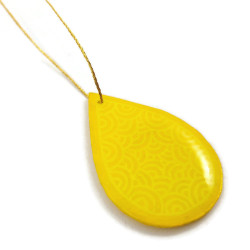 Yellow drop suspension with light yellow doodles